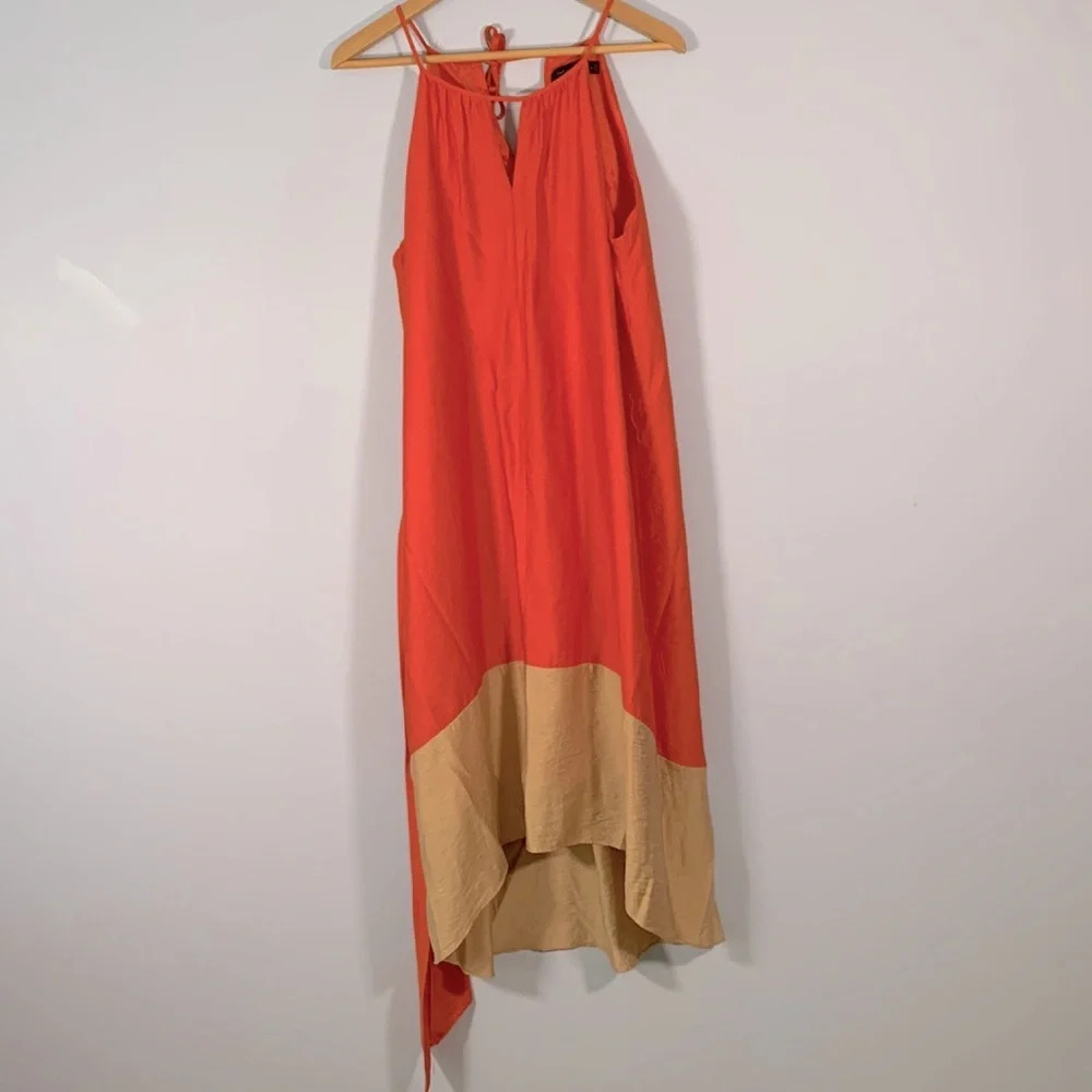 The limited size medium 2 tone orange and tan taffeta silk like sleeveless dress